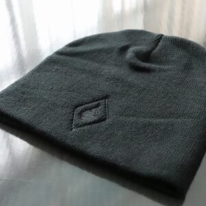 Black knit beanie with embroidered Arctic Chiller logo shown as custom corporate branded winter apparel.